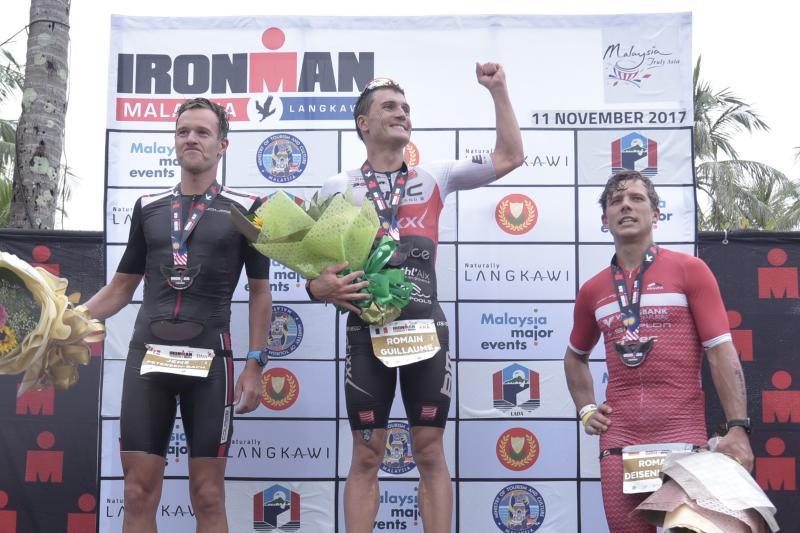 Men's Podium (from L-R) Jen Petersens-Bach (sceond placing), Romain Guillaume (champion) & Roman Deisenhofer (third placing)